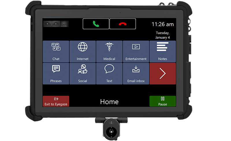 A touchscreen communication device uses assistive technology with large icons for chat, internet, medical, entertainment, notes, and more, plus call and message buttons, date, time, and navigation controls.