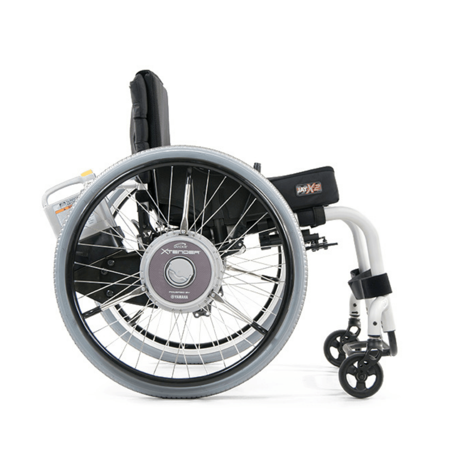 Side view of a manual wheelchair equipped with Yamaha X-Drive power assist wheels. The chair features a white frame, gray tires, and a black cushion against a plain white background.