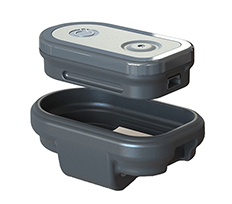 A close-up of a Quha Zona wireless switch device with its top and base components slightly separated. The compact, oval-shaped switch has a sleek gray design and a tactile surface with power and function icons.