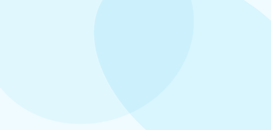 Light blue overlapping transparent circles on a pale blue background, creating a soft, abstract, minimalistic design.
