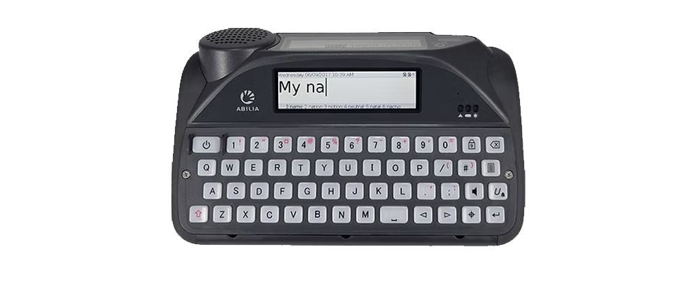 A black Abilia Lightwriter SL50 communication device featuring a screen displaying My na, a full QWERTY keyboard, and a speaker on the top left.