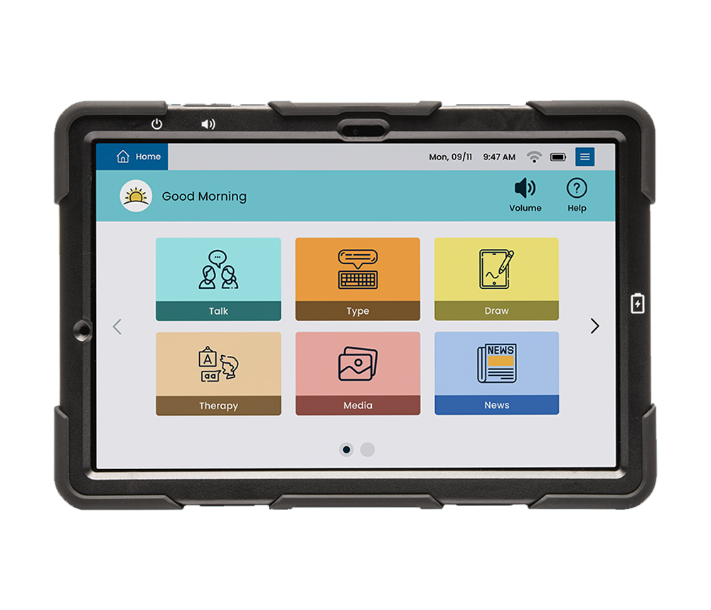 A rugged tablet displays a communication app with colorful icons labeled Talk, Type, Draw, Therapy, Media, and News on the main screen. The Good Morning greeting at the top makes it perfect for assistive communication.